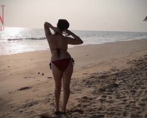 Nice Lady at Lonely Nudist Beach. Red Swimsuit. Red Bikini.