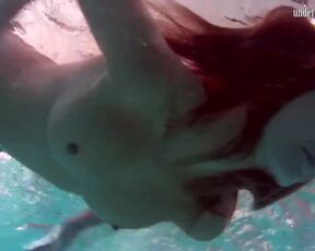 Sexy underwater redhead Nikita Vodorezova